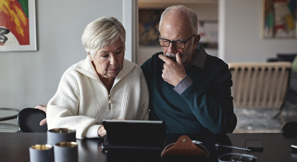 Couple meditating on their home and financial picture